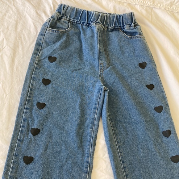 Other - Wide leg, black heart detail jeans.